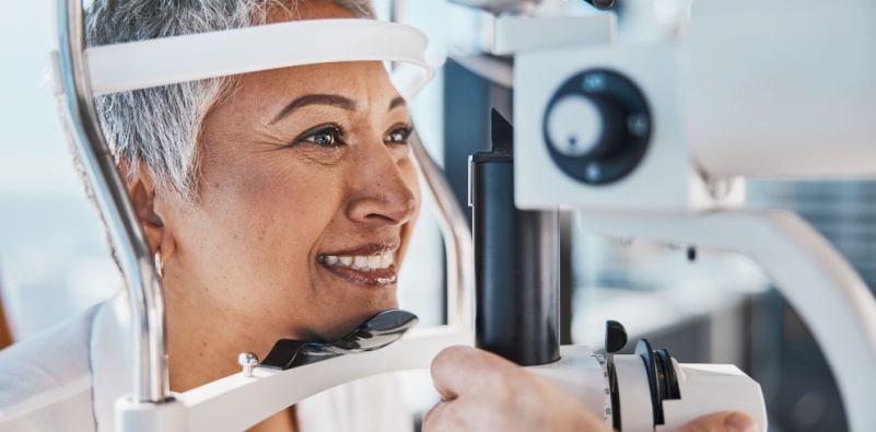 A woman having an eye exam at the opticians