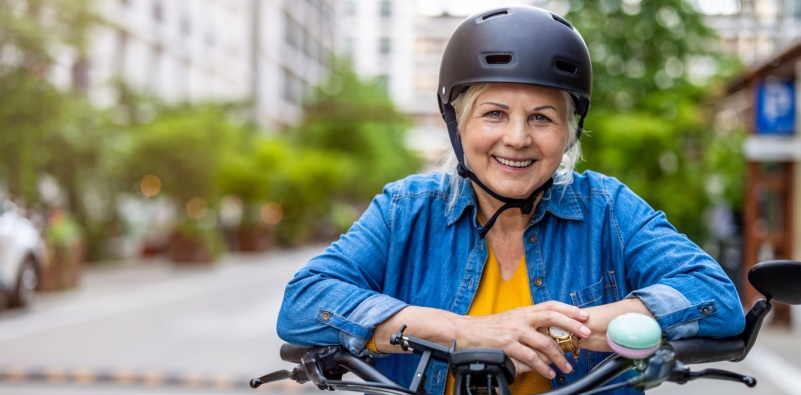 older woman wearing a cycling helmet