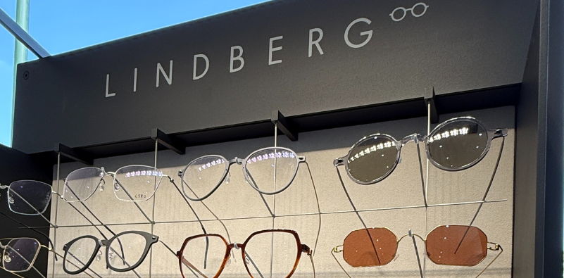 A photo of the LINDBERG eyewear display at Optikal Opticians showcasing a mix of optical and sunglasses products.